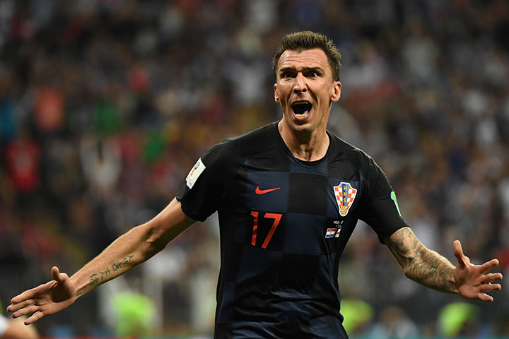 Croatia's forward Mario Mandzukic celebrates after scoring his team's second goal during the Russia 2018 World Cup semi-final match between Croatia and England at the Luzhniki Stadium in Moscow on July 11, 2018. 