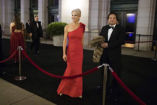 Kellyanne Conway, accompanied by her husband, George, speaks with members of the media in Washington on Jan. 19, 2017, the day before Trump’s inauguration.