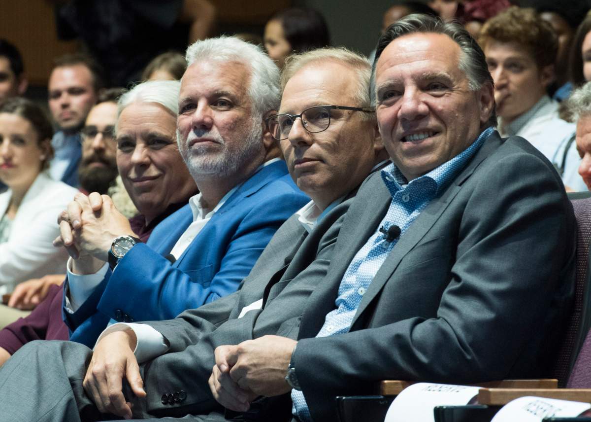 Québec Solidaire spokesperson Manon Massé, left to tight, Quebec Premier Philippe Couillard, Parti Québécois leader Jean-François Lisée and CAQ leader François Legault.
