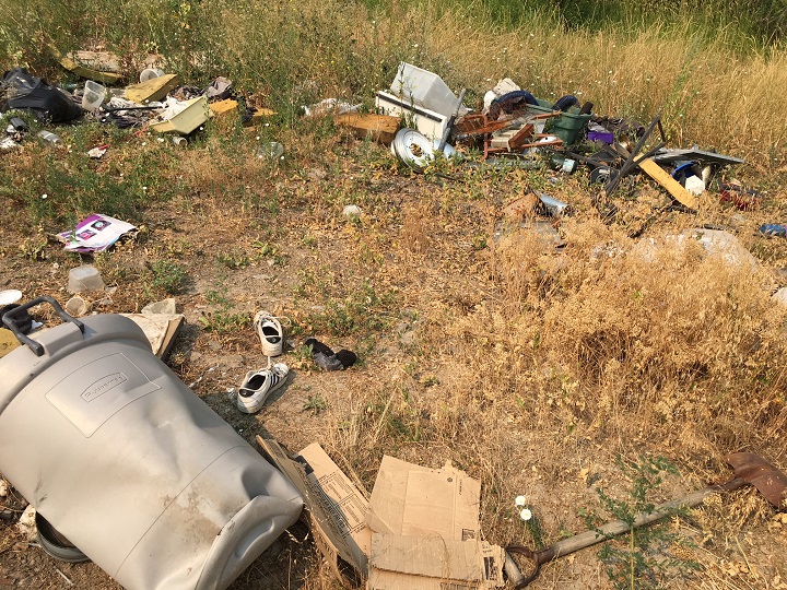 A small pile of refuse found near a homeless shelter near McCurdy Road and Highway 97 in Kelowna.