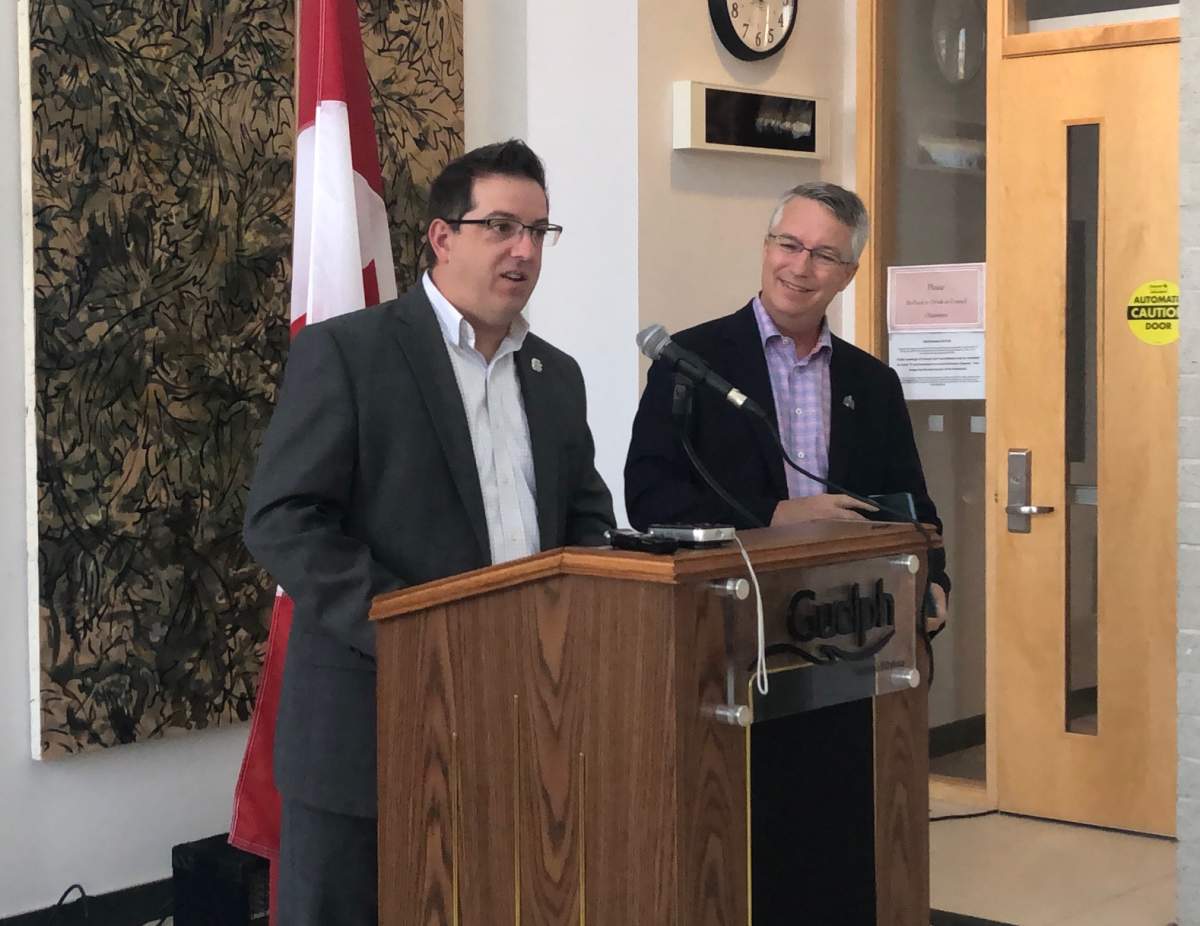 Guelph Mayor Cam Guthrie and MP Lloyd Longfield speak at a news conference in August 2018.