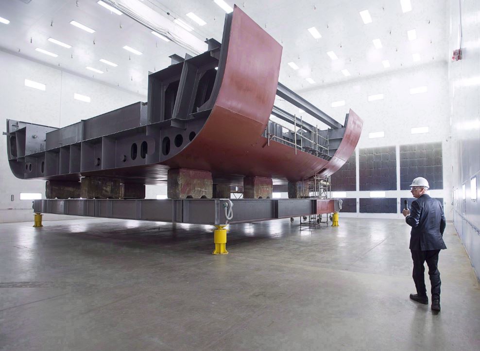 A Nova Scotia MP says there are no changes planned to the National Shipbuilding Strategy that would compromise Irving Shipbuilding's role. Kevin McCoy, president of Irving Shipbuilding, leads a tour as workers construct components of the Arctic offshore patrol ships at their facility in Halifax on Friday, March 4, 2016. 