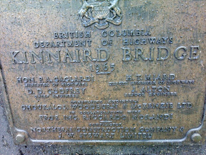 A commemorative plaque is shown on the Kinnaird Bridge in Castlegar, B.C.