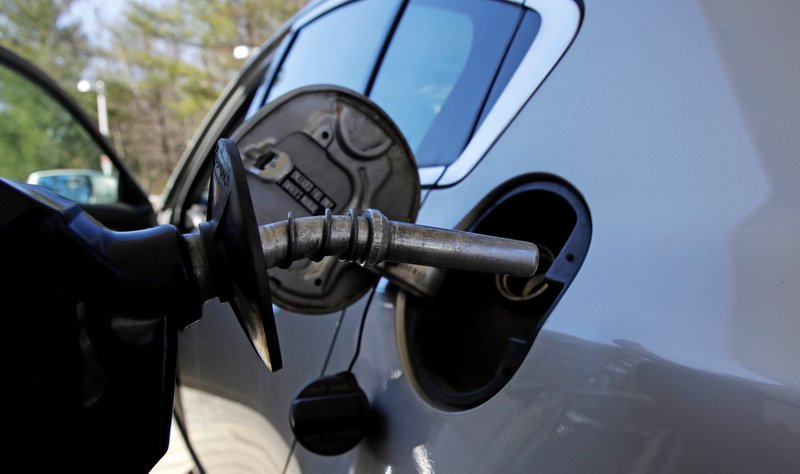 None
FILE- In this April 23, 2018, file photo a car is filled with gasoline at a station in Windham, N.H. Conserving oil is no longer an economic imperative for the U.S., the Trump administration declares in a major new policy statement that threatens to undermine decades of government campaigns for gas-thrifty cars and other conservation programs.