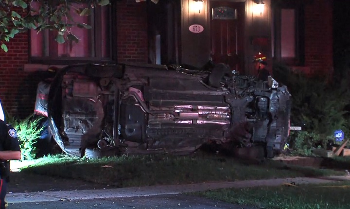 A vehicle is on its side following a collision at Pharmacy Ave. and Dorine Cres. in Toronto on Aug. 29, 2018.