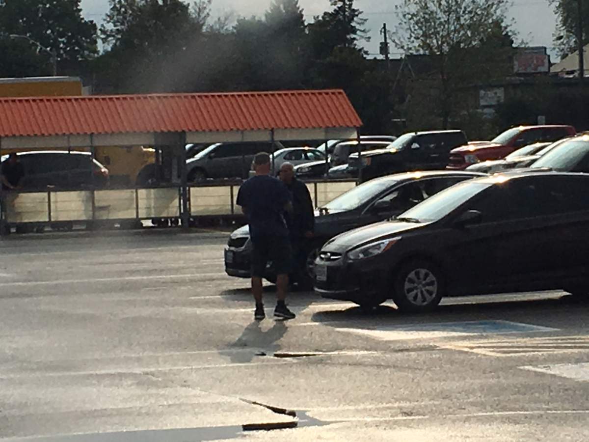 Peterborough police arrest Terrance Finn at the Home Depot parking lot on Aug. 22, 2018. A witness said Terrance Finn (facing) shot a woman in the parking lot.