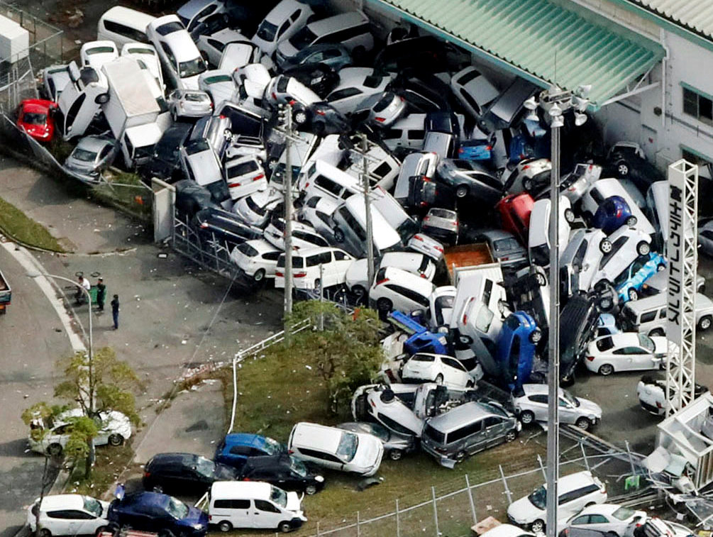 Vehicles damaged by Typhoon Jebi are seen in Kobe, western Japan, in this photo taken by Kyodo September 5, 2018. Mandatory credit Kyodo/via REUTERS.
