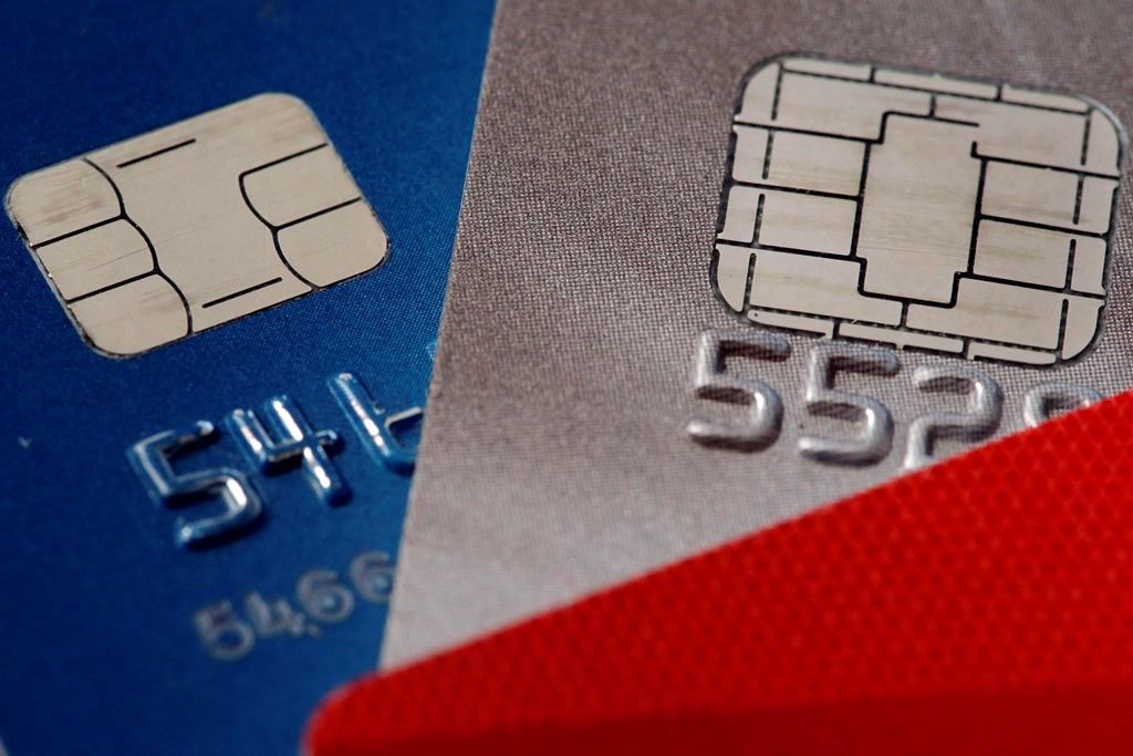 A Newfoundland woman has been charged after police said she used a stolen credit card to buy a winning lottery ticket.