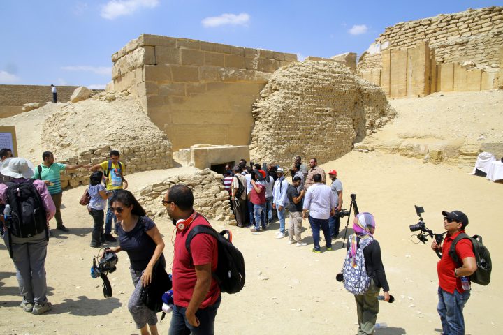 People wait outside one of the chambers of the tomb of Mehu, after it was opened for tourists at Saqqara area, Giza, Egypt, Sept. 8, 2018.