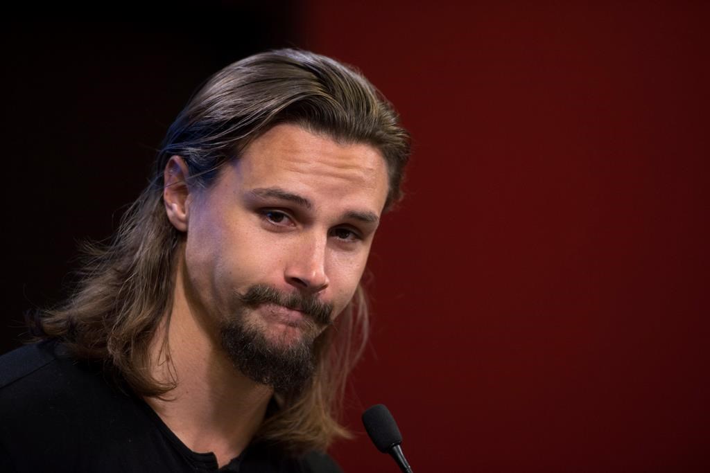 Erik Karlsson talks to media during the Ottawa Senators first day of hockey training camp in Ottawa on Thursday, Sept. 13, 2018.