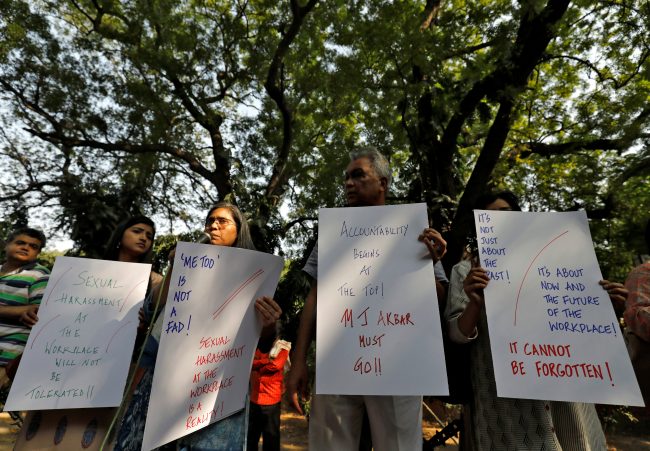 Indian journalists hold placards during a protest against what they say is sexual harassment in the workplace in New Delhi, India, October 13, 2018.