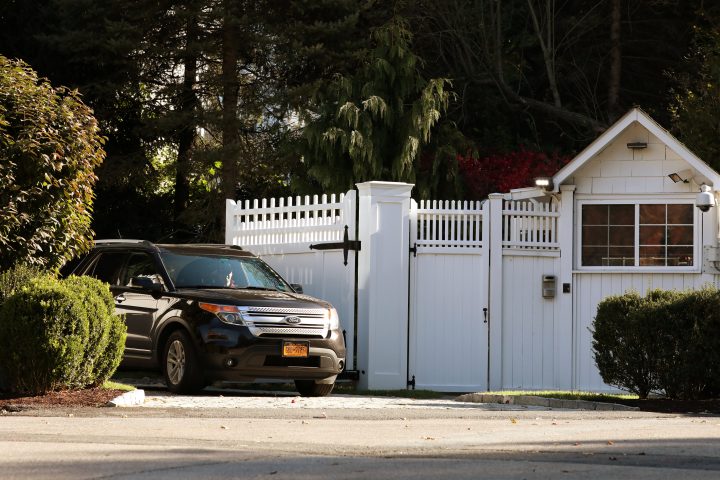 A car is pictured in the driveway of the house of Bill and Hillary Clinton in Chappaqua, New York, U.S., Oct. 24, 2018.