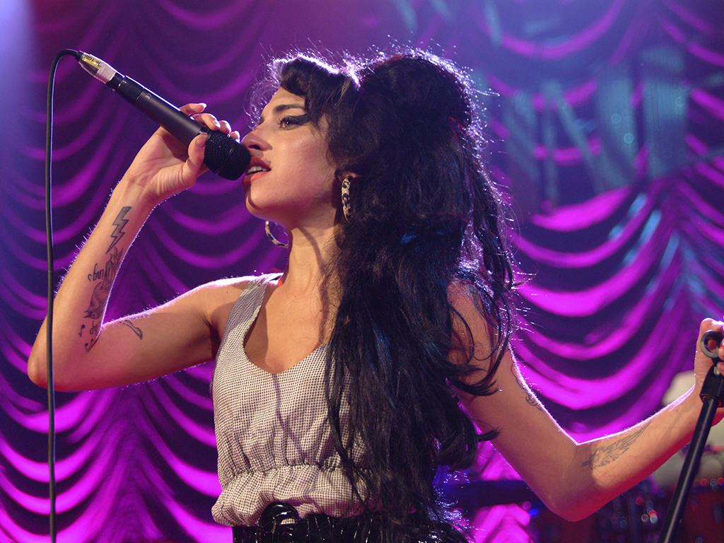 Amy Winehouse, performing at Shepherd’s Bush in London, England.