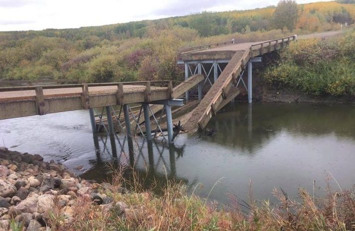 A collapsed bridge is seen in the Regional Municipality of Clayton in a Tuesday, Sept. 18, 2018, handout photo.