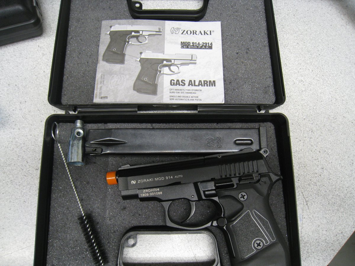Police and border service agents intercepted a package they say contained two guns. The package was addressed to a Kingston man.
