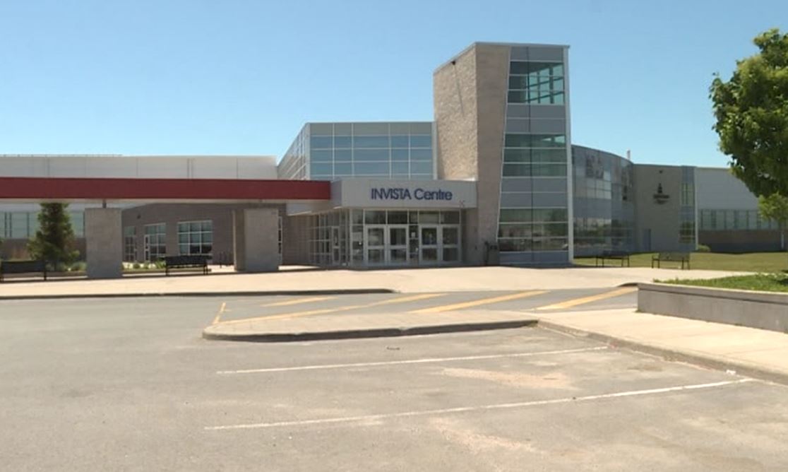 Kingston police say a woman drove impaired over a soccer field near the Invista Centre in order to get to a nearby bar. 
