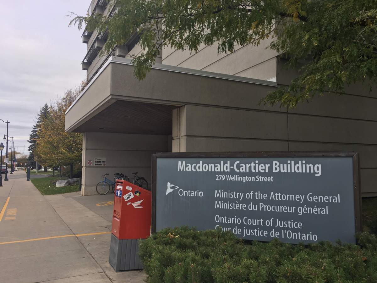 The Kingston youth suspected of terrorist activity had one of his charges dropped on Wednesday when he appeared at a Kingston court.