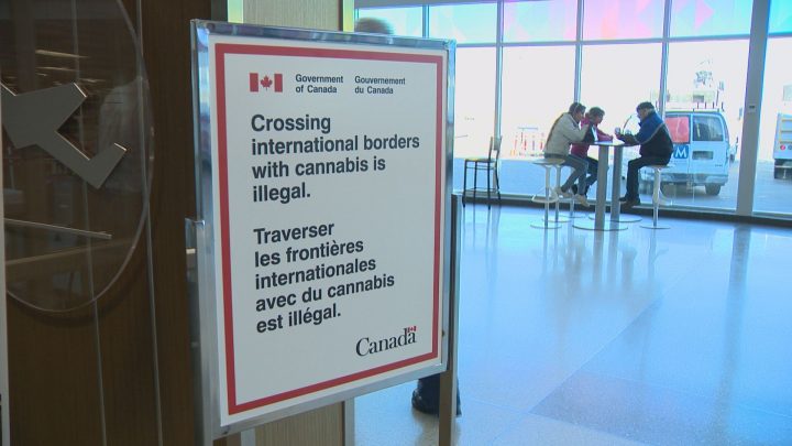 This sign is displayed in front of the airport security check-in at the Saskatoon airport.
