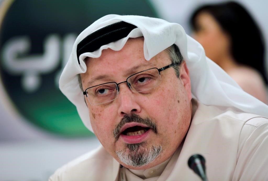 FILE – In this Feb. 1, 2015, file photo, Saudi journalist Jamal Khashoggi speaks during a press conference in Manama, Bahrain.