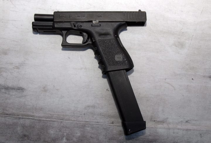 This is not the exact gun used by California shooter Ian David Long, but it shows what a extended magazine looks like. The device is attached to a Glock 9mm gun in this photo.