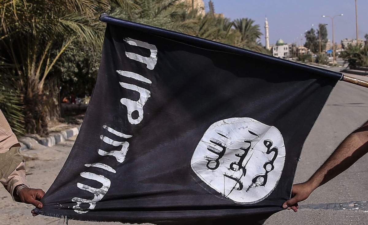 Seized ISIS flag in Palmyra, Syria, MARCH 26, 2016. Valery Sharifulin/TASS.