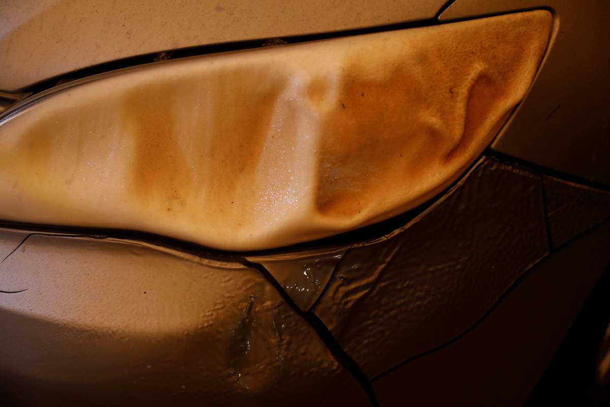 A vehicle charred by the Camp Fire is seen in Paradise, California, U.S., November 9, 2018.