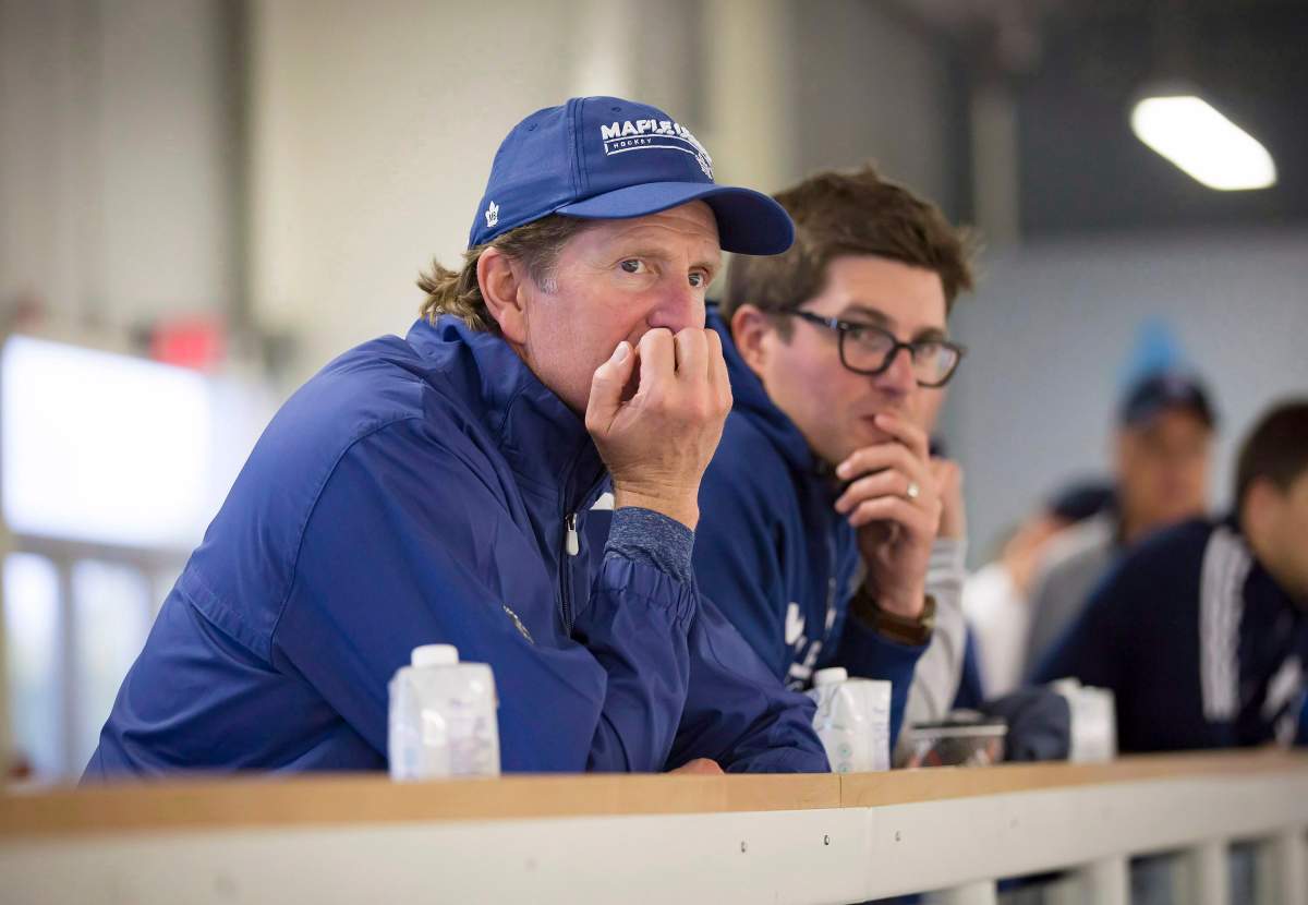 Toronto Maple Leafs head coach Mike Babcock, left, and general manager Kyle Dubas have a 5 p.m. deadline on Saturday, Dec. 1 to sign restricted free agent William Nylander.