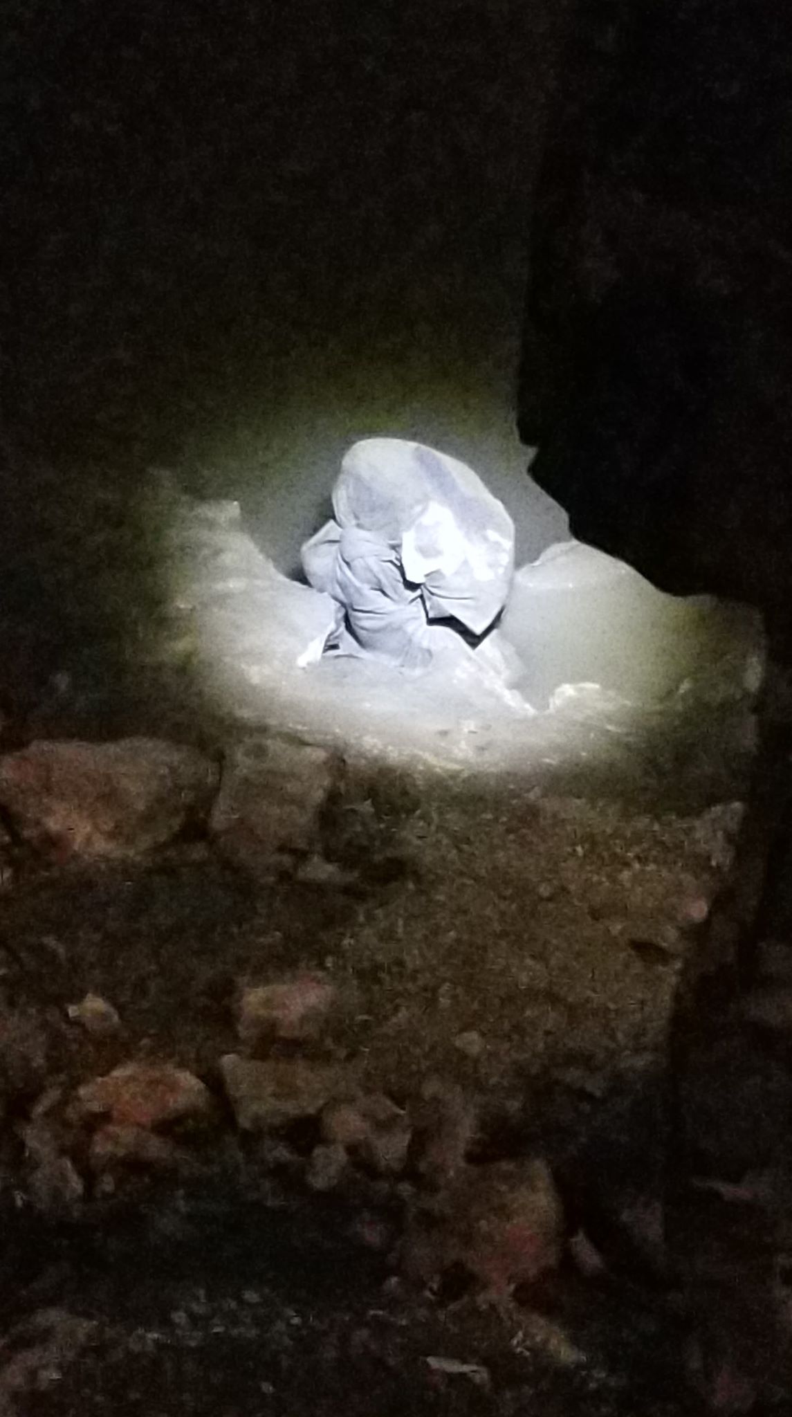 The bag was sitting among rocks along the Red River.