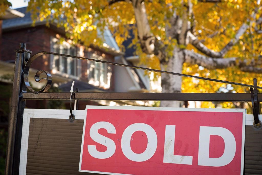 The Kitchener-Waterloo Association of Realtors says home sales were down but prices were up in the region last month.