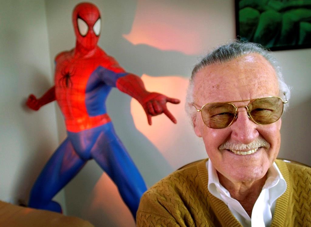 FILE – In this April 16, 2002, file photo, Stan Lee, 79, creator of comic-book franchises such as “Spider-Man,” “The Incredible Hulk” and “X-Men,” smiles during a photo session in his office in Santa Monica, Calif. (AP Photo/Reed Saxon)