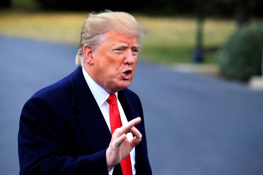 President Donald Trump speaks to the members of the media before leaving the White House in Washington, Friday, Nov. 2, 2018, for a campaign rally in Huntington, W.Va., and Indianapolis. (AP Photo/Manuel Balce Ceneta).
