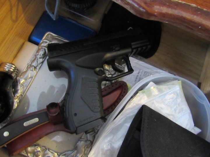 Five people were charged after Calgary police seized drugs, guns and bikes from a house in the city’s northwest.