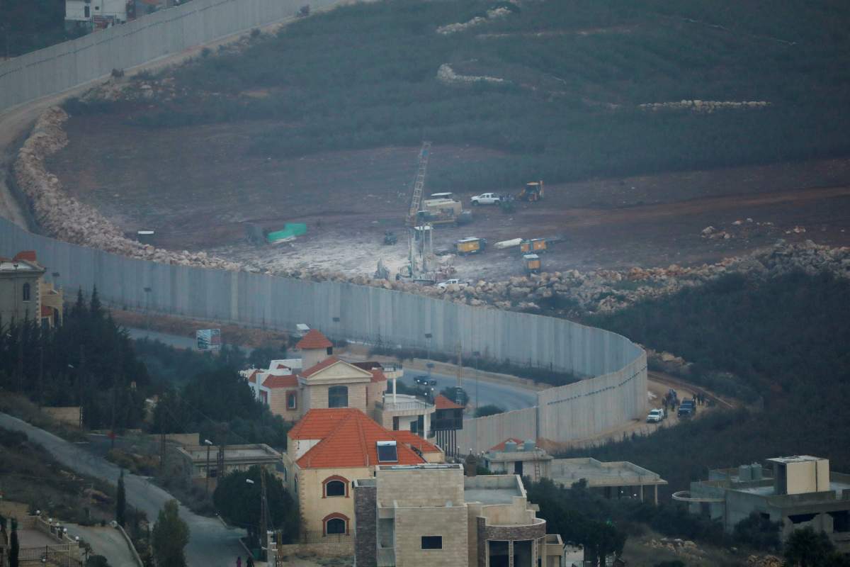 Israeli drilling equipment is seen next to the border with Lebanon, near the Lebanese village of Kfar Kila, seen from the Israel’s side December 4, 2018.
