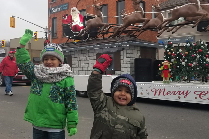 Martin Montoya (left) and Thomas Montoya (right) at a Christmas parade.