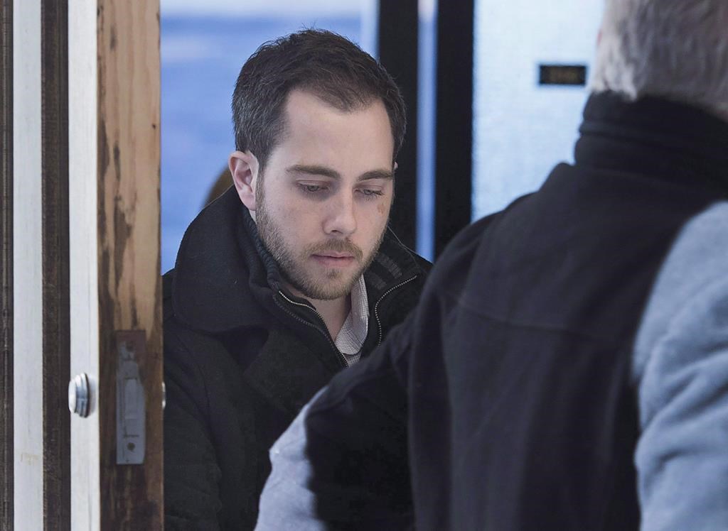 Christopher Calvin Garnier, charged with second-degree murder in the death of Truro police officer Const. Catherine Campbell, heads from Nova Supreme Court during a break in Halifax on Wednesday, Dec. 20, 2017. 