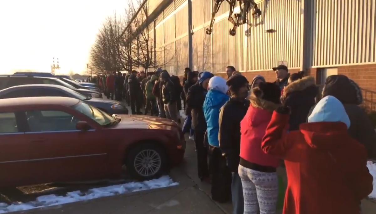 Hundreds of families lined up at the Western Fair Agriplex to receive a Christmas hamper. 