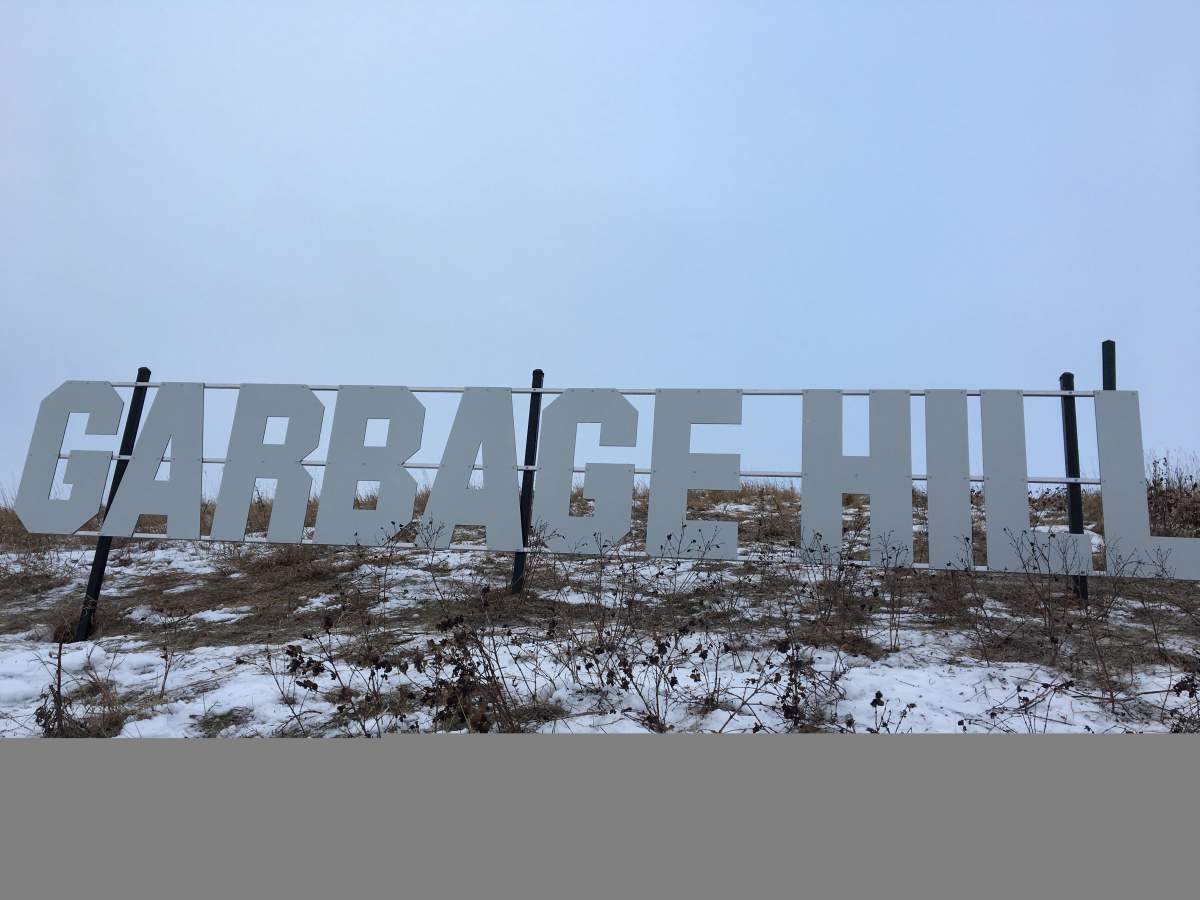 The new Garbage Hill sign.