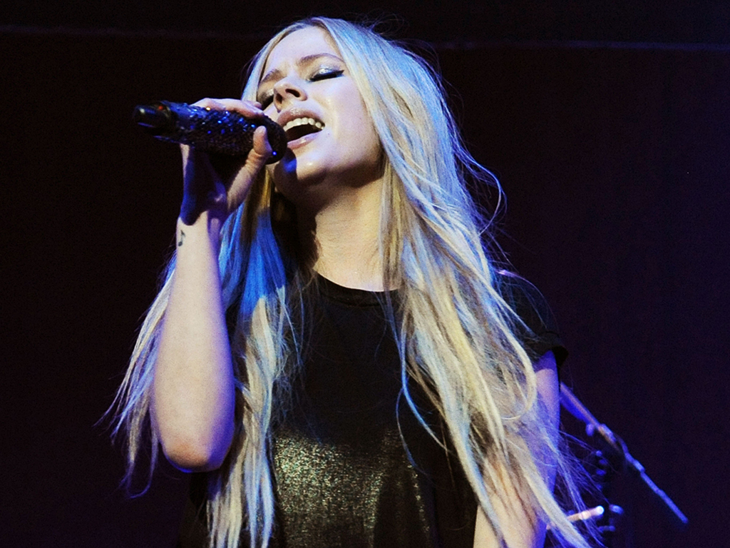 Avril Lavigne performs during the 2013 Star '94 Jingle Jam at the Gwinnett Center on Dec. 16, 2013 in Duluth, Ga.