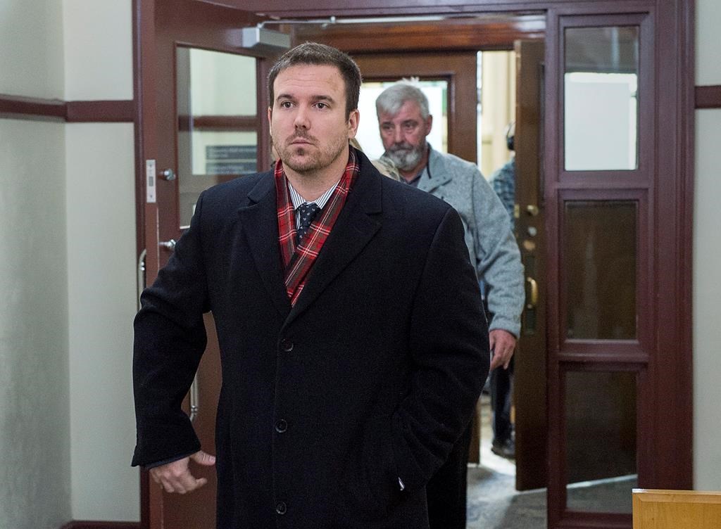 Const. Laurence Gary Basso heads from provincial court in Halifax on Wednesday, Dec. 5, 2018. Basso faces charges of assault and falsifying information in police reports relating to the alleged assault of a man at a homeless shelter. THE CANADIAN PRESS/Andrew Vaughan