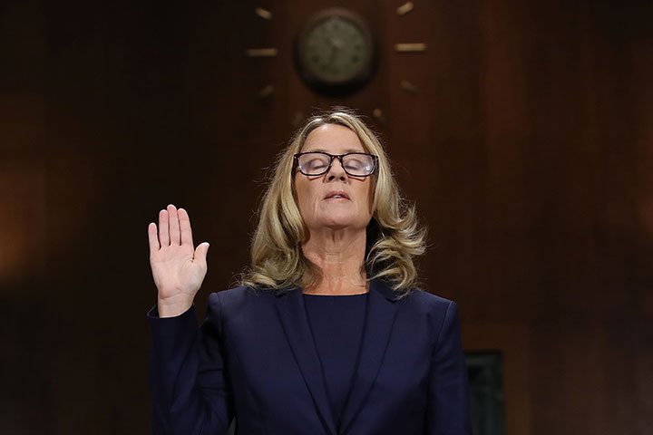 Christine Blasey Ford is sworn in before testifying the Senate Judiciary Committee in the Dirksen Senate Office Building on Capitol Hill September 27, 2018 in Washington, DC.