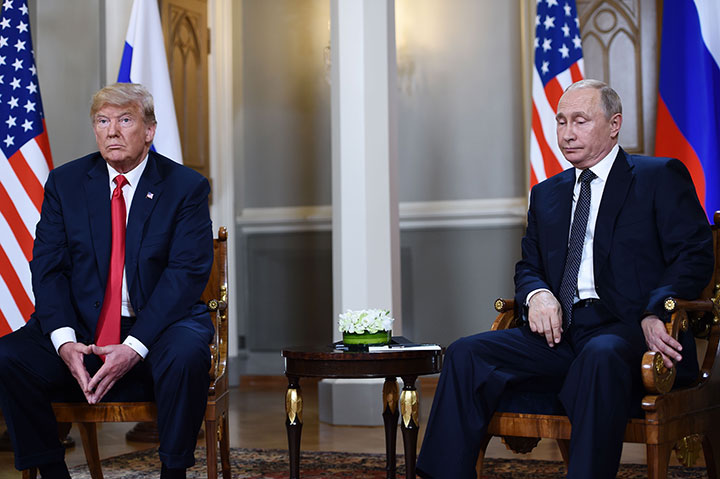 Russian President Vladimir Putin and U.S. President Donald Trump attend a meeting in Helsinki, on July 16, 2018.