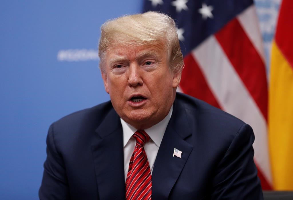 FILE - In this Dec. 1, 2018, file photo, President Donald Trump speaks to media at the G20 summit, in Buenos Aires, Argentina.