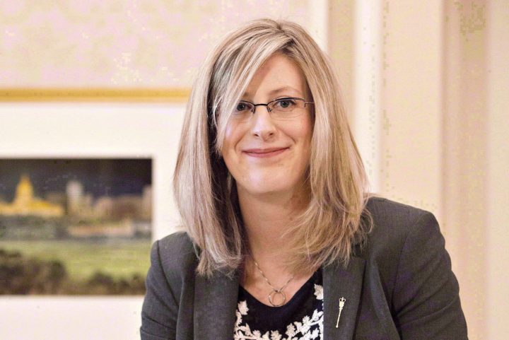 Stephanie McLean is pictured being sworn in as a new cabinet minister in Edmonton in 2016. 