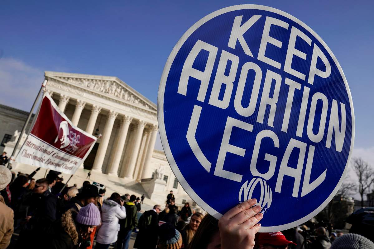 An abortion rights activist holds up a sign as marchers take part in the 46th annual March for Life in Washington, U.S., January 18, 2019.      