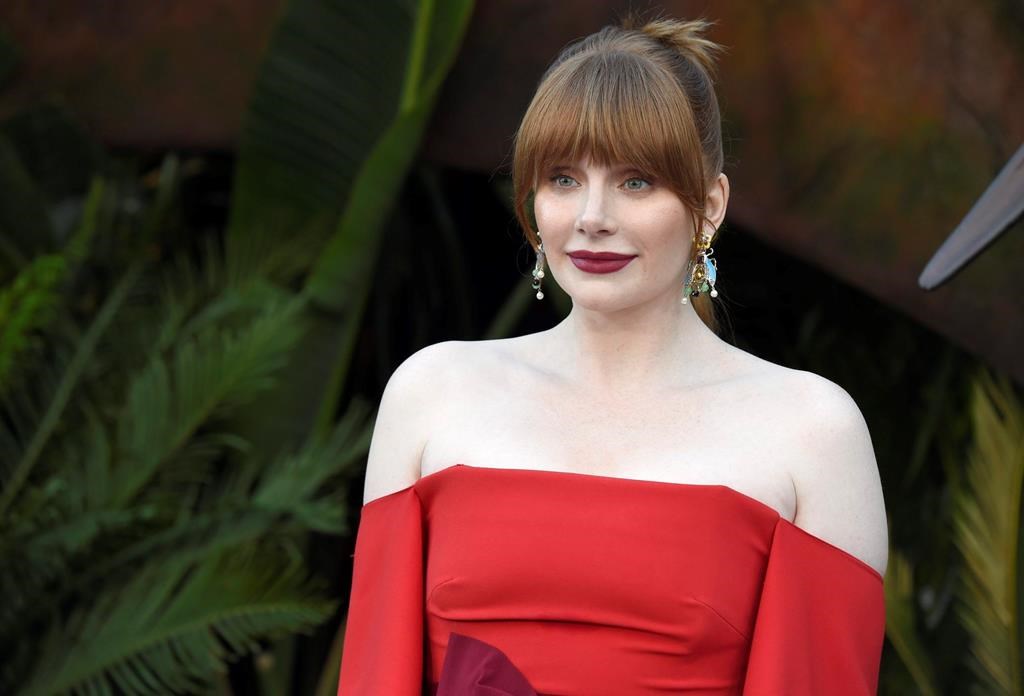 FILE -- In this Tuesday, June 12, 2018 file photo actor Bryce Dallas Howard arrives at the Los Angeles premiere of "Jurassic World: Fallen Kingdom" at the Walt Disney Concert Hall. Howard, an actor, producer and director, has been named 2019 Woman of the Year by Harvard University's Hasty Pudding Theatricals student group.