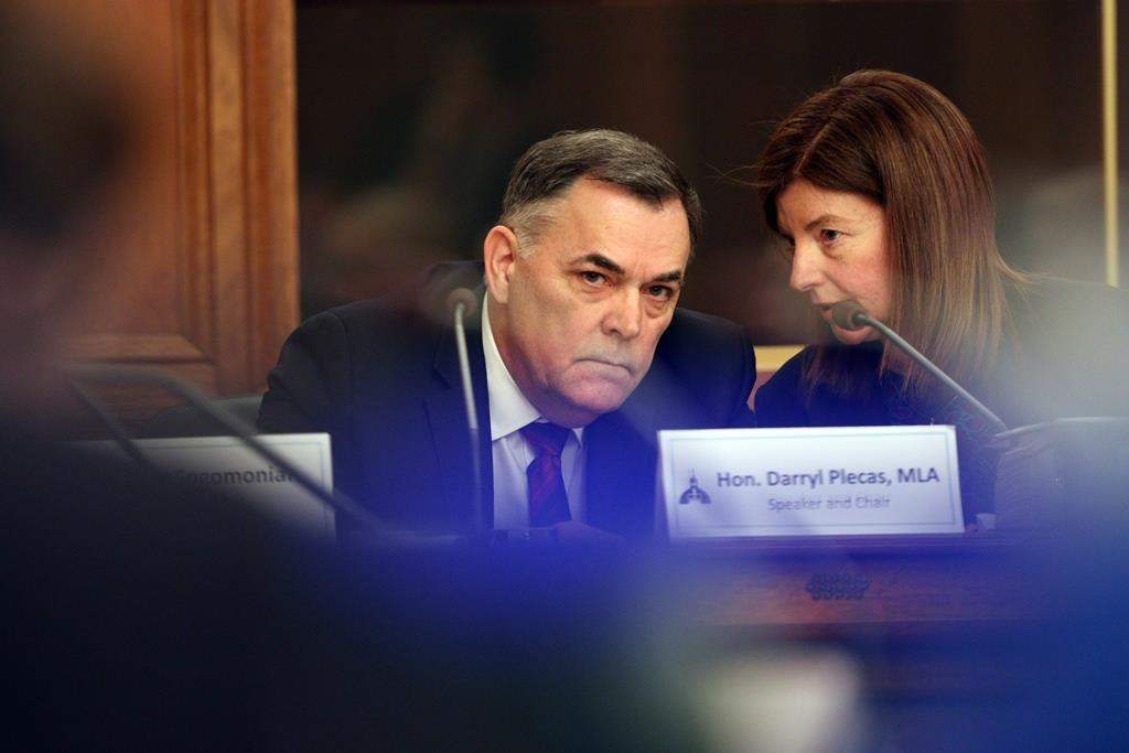 House Speaker Darryl Plecas speaks with Kate Ryan-Lloyd acting clerk of the house during a Legislative Assembly Management Committee meeting in the Douglas Fir room at Legislature in Victoria, B.C., on Monday, January 21, 2019. THE CANADIAN PRESS/Chad Hipolito.
