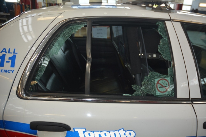 Image of a Toronto police cruiser with a window shattered by a bullet. (SIU/Handout)