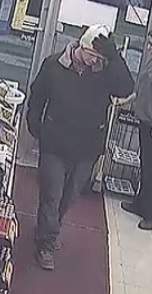 Surveillance photo of the robbery suspect.