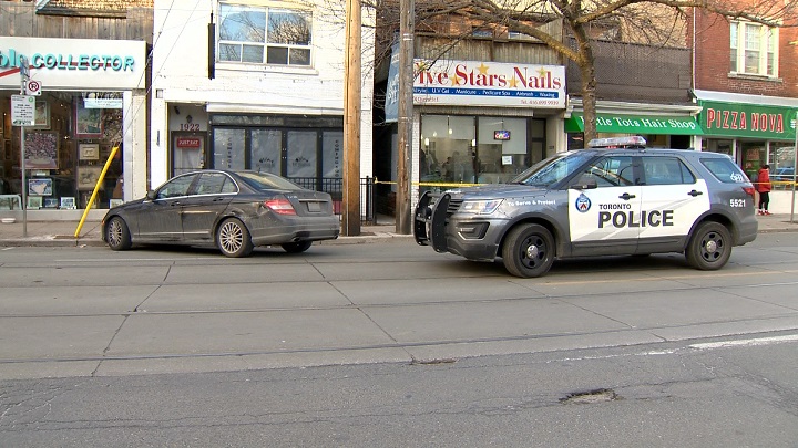Toronto police on scene of a double shooting near Queen Street and Woodbine Avenue on Sunday afternoon.