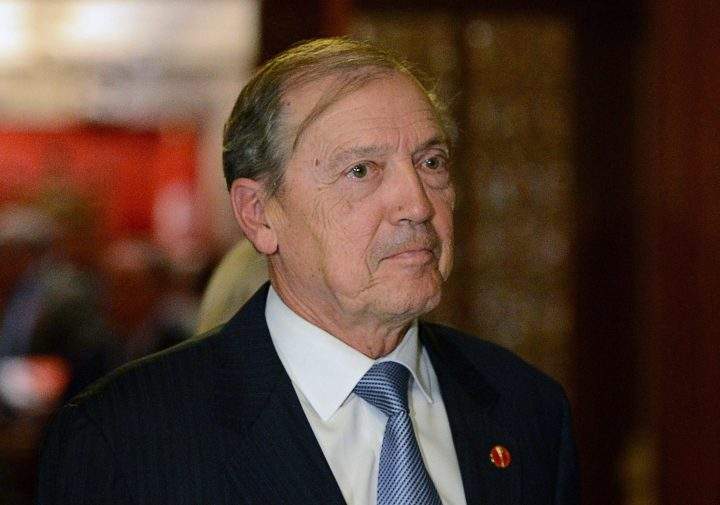 Sen. David Tkachuk leaves the Senate on Parliament Hill in Ottawa on Tuesday, Oct. 22, 2013. 